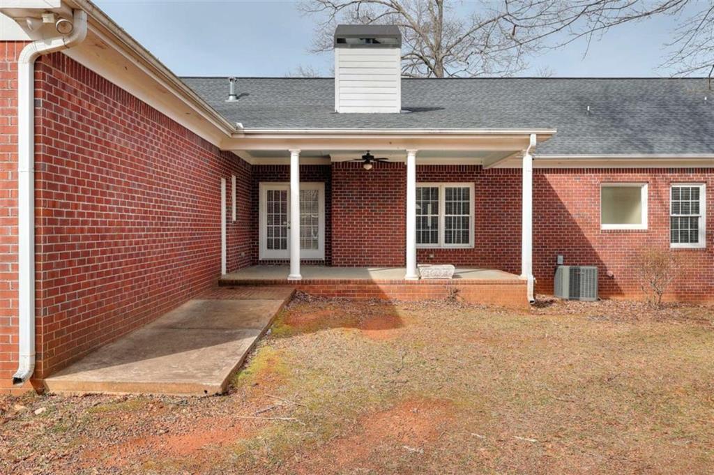 1799 Eliza Doster Road Monroe, GA 30656 - Photo 44 of 60 a view of a house with a patio