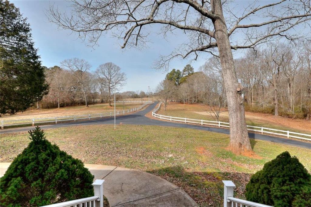 1799 Eliza Doster Road Monroe, GA 30656 - Photo 5 of 60 a view of a yard with an outdoor space