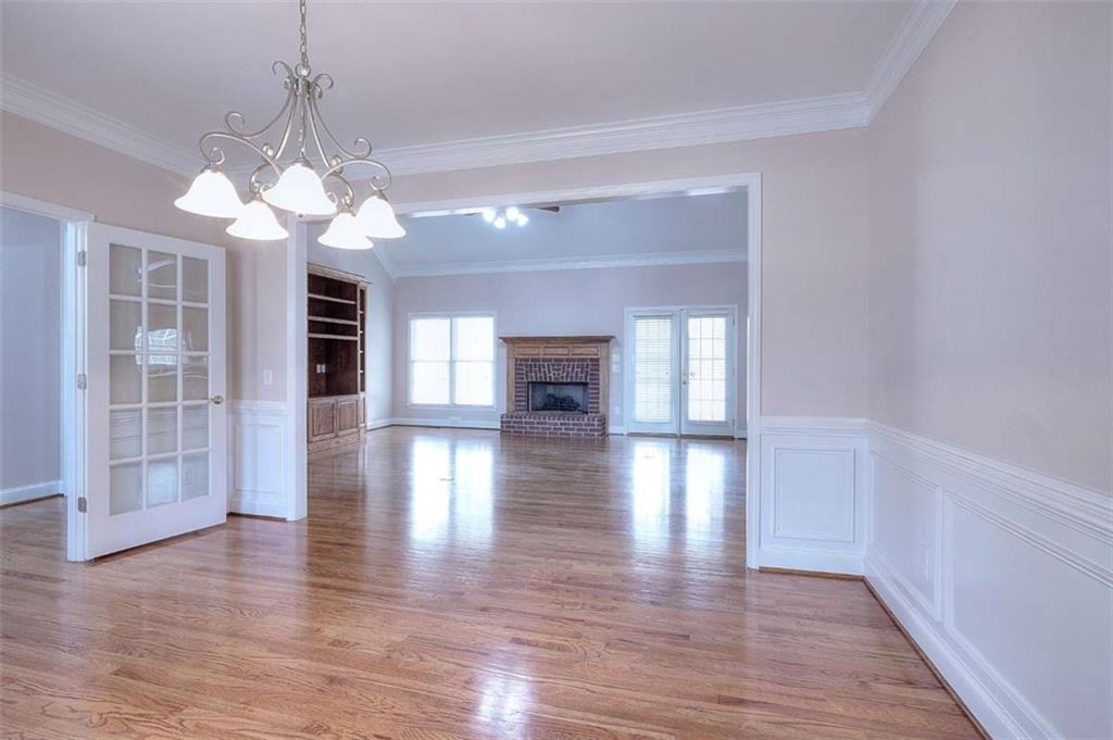 1799 Eliza Doster Road Monroe, GA 30656 - Photo 8 of 60 a view of a livingroom with a ceiling fan and window