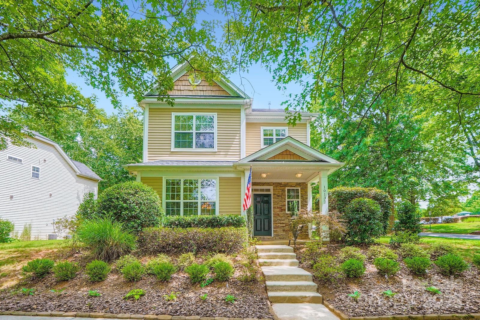 10132 Caldwell Depot Road Cornelius, NC 28031 - Photo 3 of 28 a front view of a house with a yard