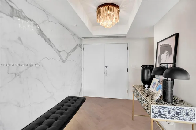 a view of kitchen with cabinets and wooden floor