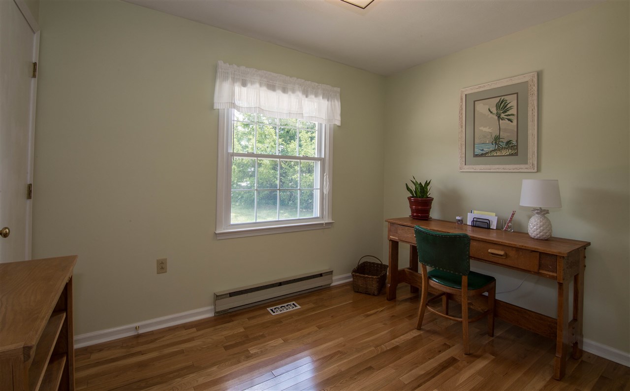 2638 Spaders Church Road Harrisonburg, VA 22801 - Photo 15 of 19 a view of a workspace with furniture and a window