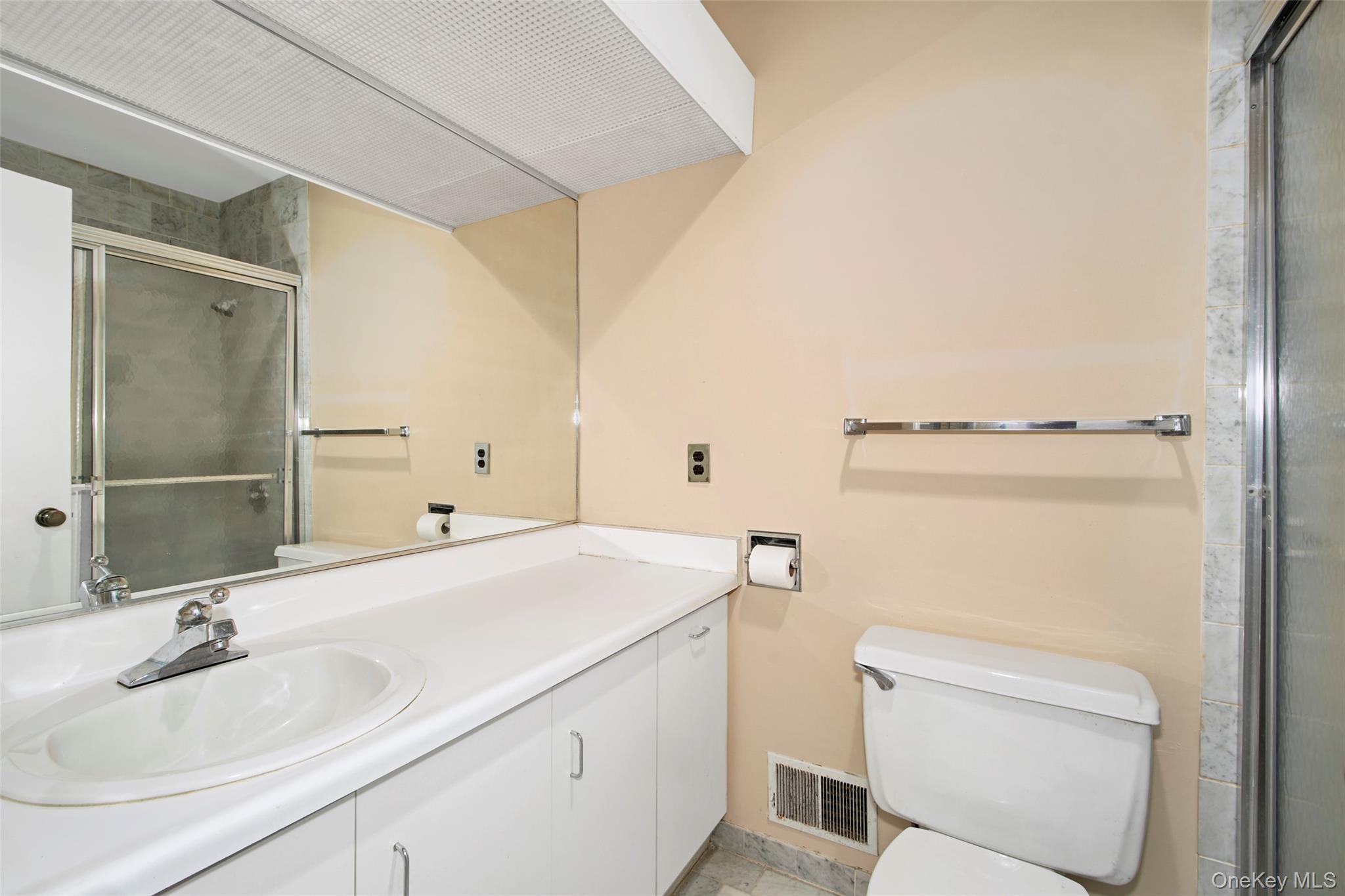 21 Waters Edge, Unit 21 Rye, NY 10580 - Photo 18 of 29 a bathroom with a sink toilet and shower