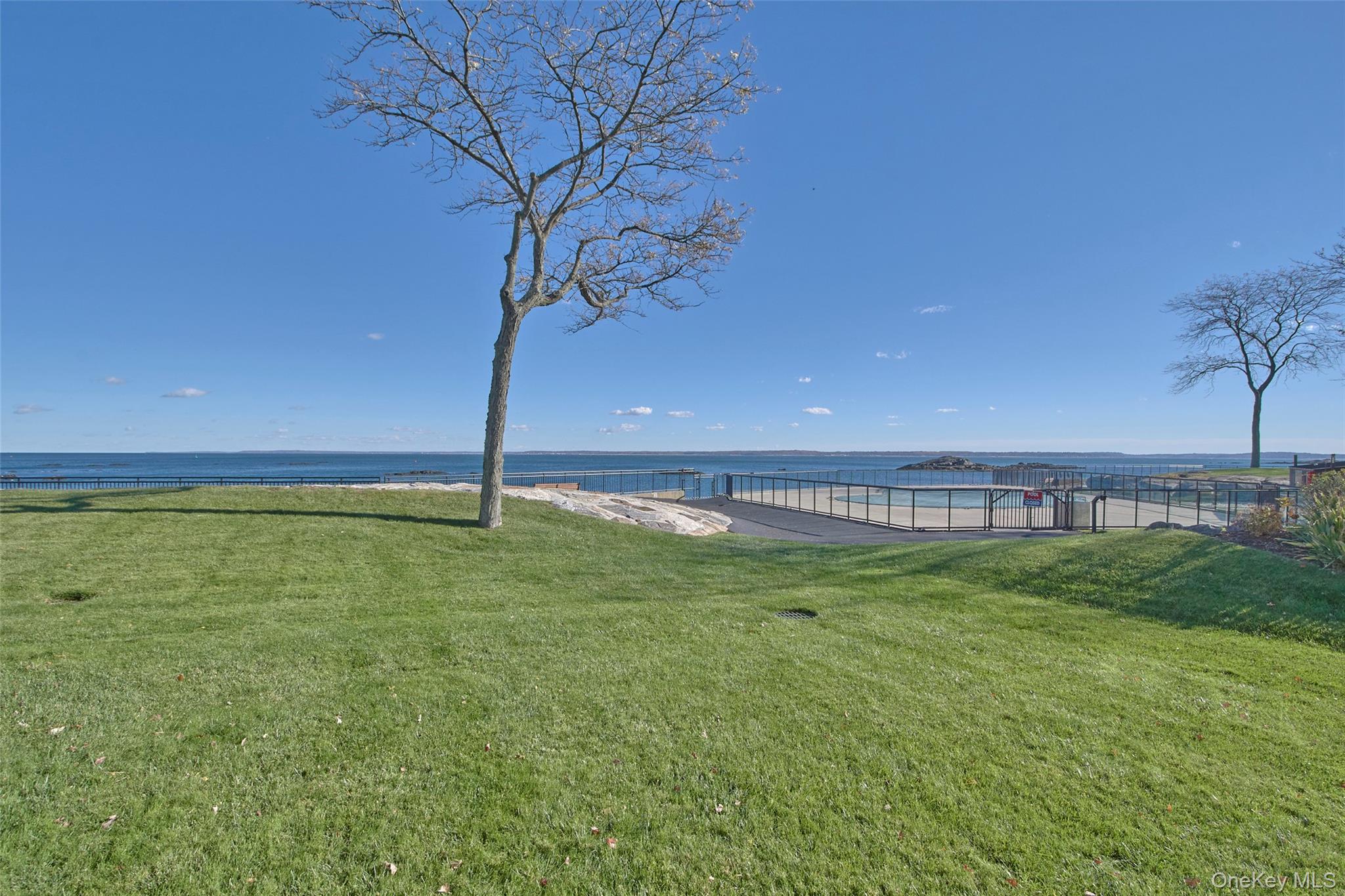 21 Waters Edge, Unit 21 Rye, NY 10580 - Photo 23 of 29 a view of an outdoor space and a yard