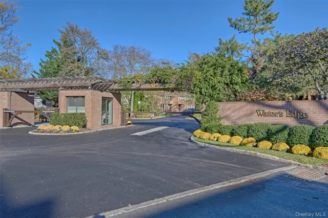 a view of livingroom with furniture and chandelier fan