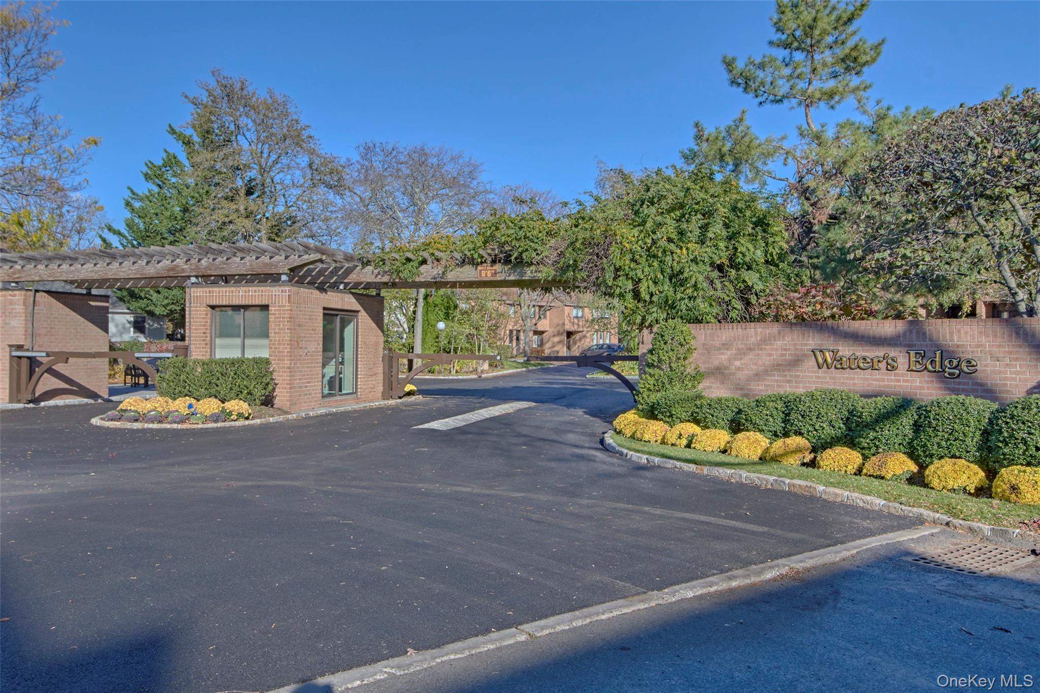 21 Waters Edge, Unit 21 Rye, NY 10580 - Photo 4 of 29 front view of a house with a street