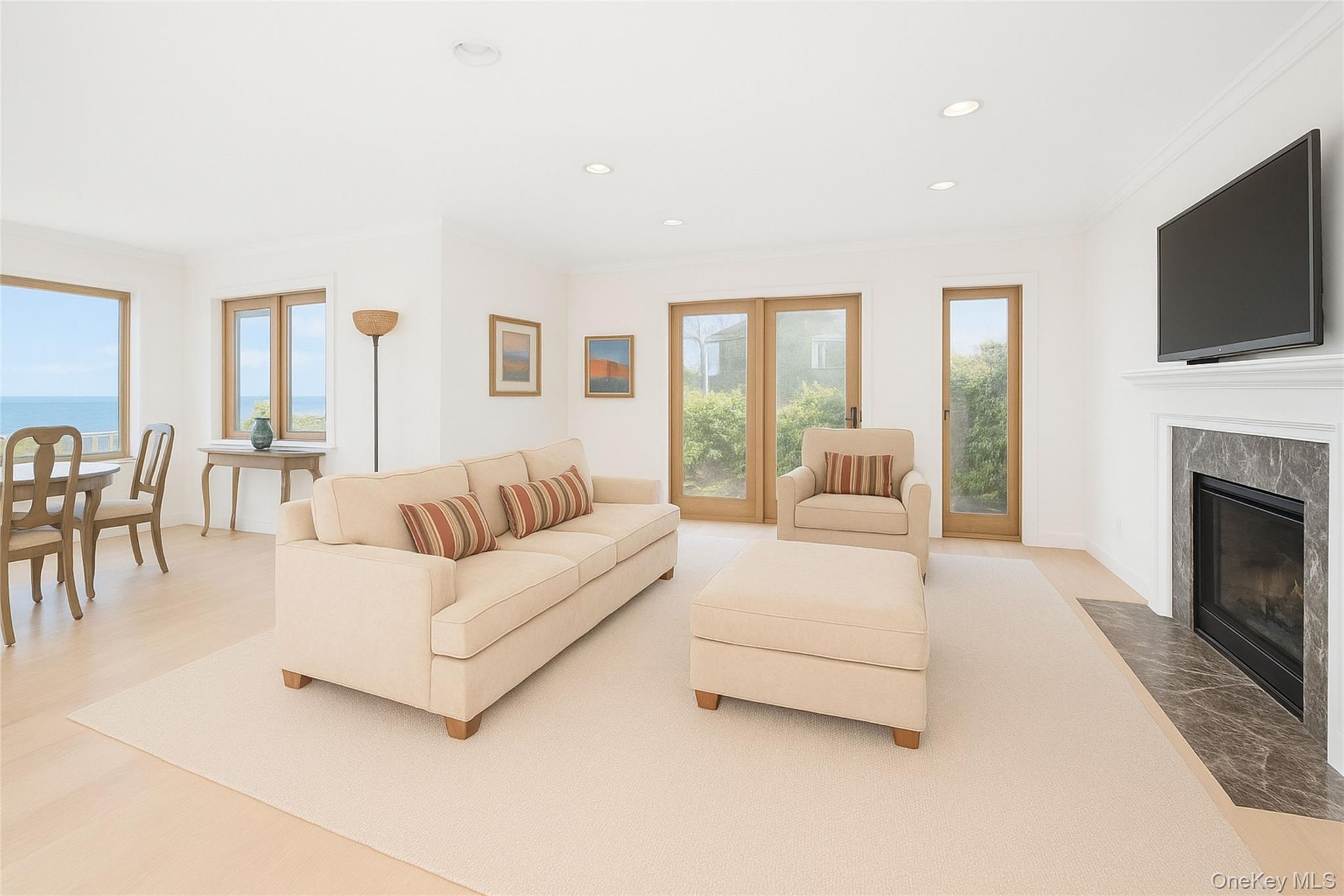 21 Waters Edge, Unit 21 Rye, NY 10580 - Photo 8 of 29 a living room with furniture a flat screen tv and a fireplace