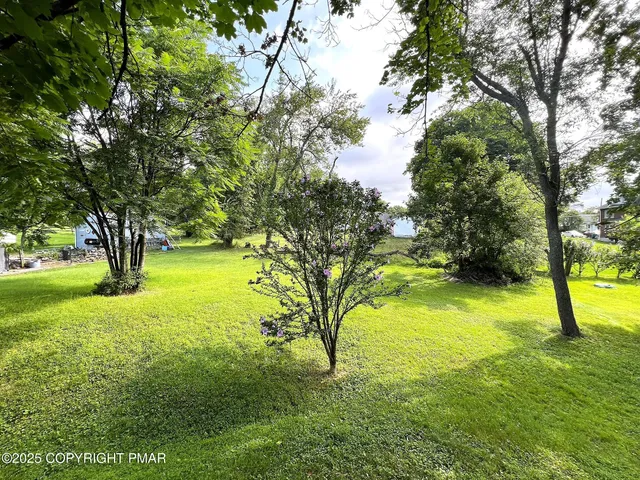 a view of an outdoor space and a yard