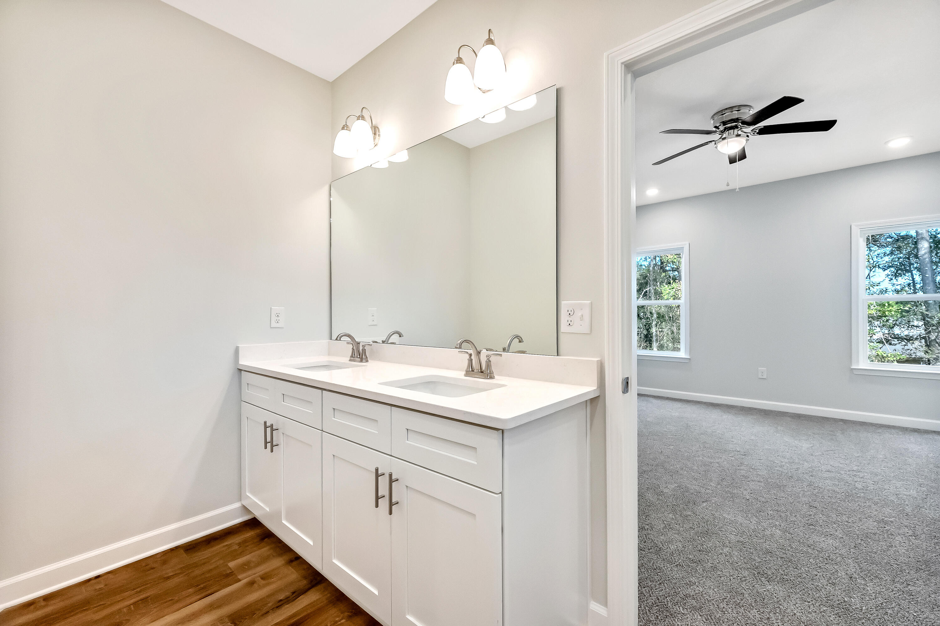 108 Huron Trail Crestview, FL 32536 - Photo 11 of 21 a bathroom with a sink and a mirror