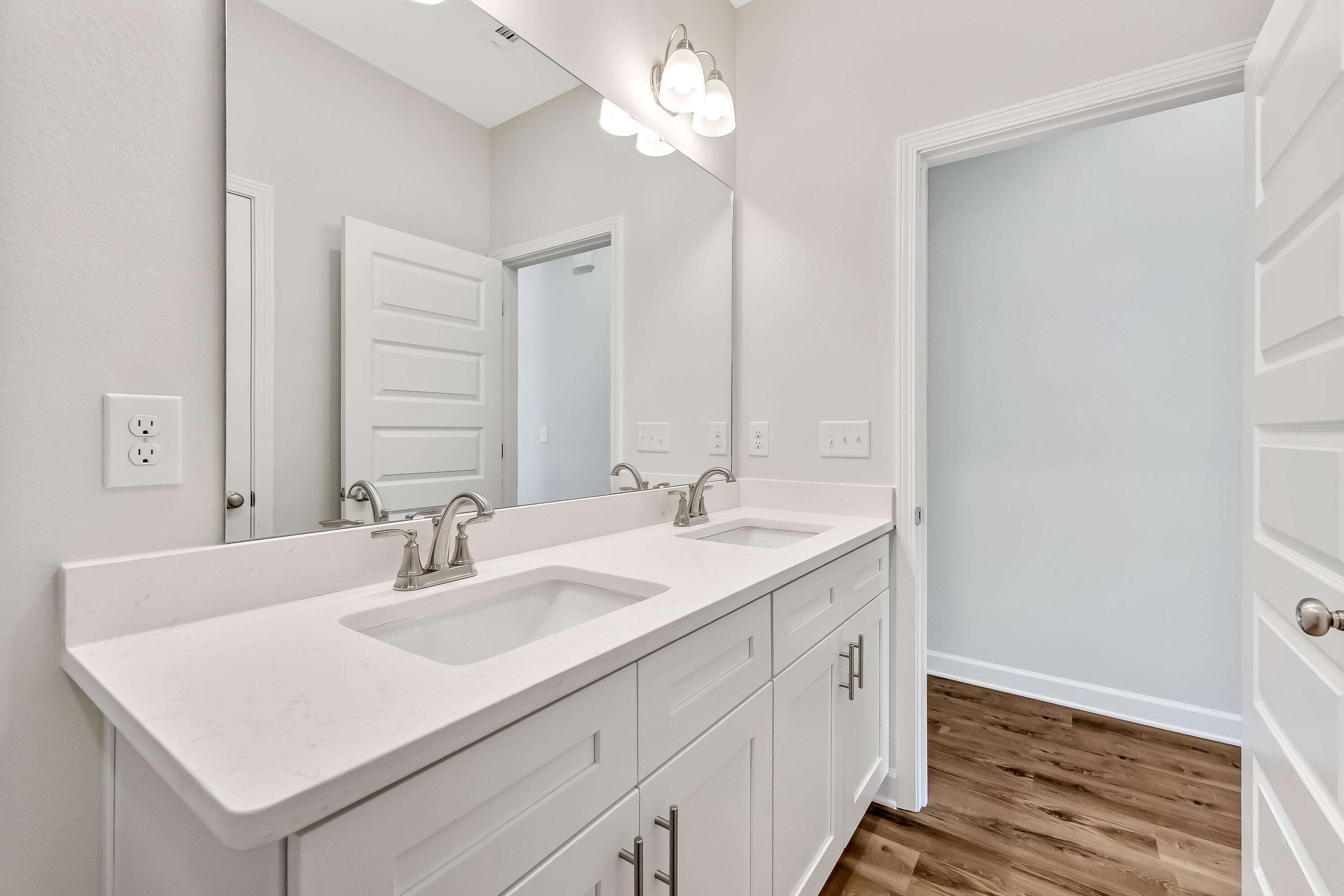 108 Huron Trail Crestview, FL 32536 - Photo 16 of 21 a bathroom with a sink double vanity and a mirror