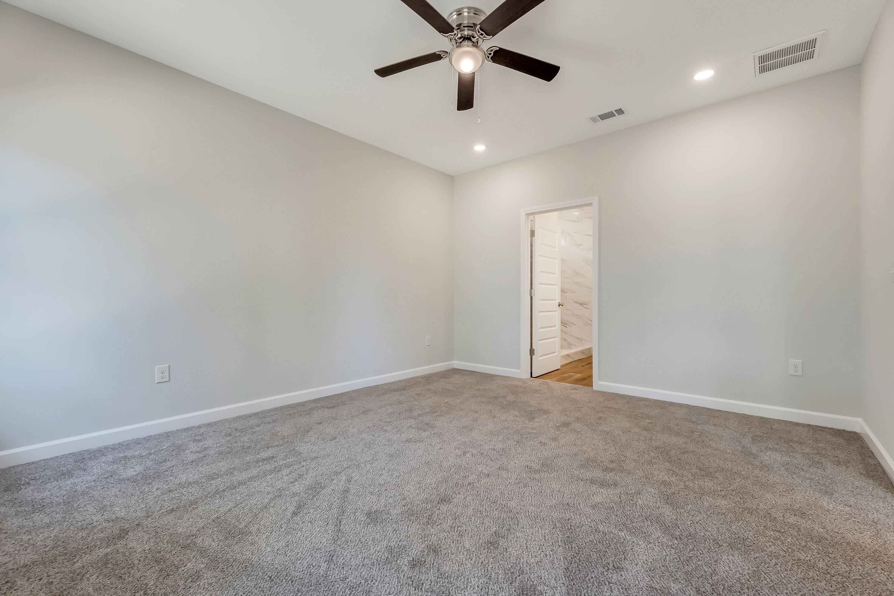 108 Huron Trail Crestview, FL 32536 - Photo 10 of 21 an empty room with closet and windows