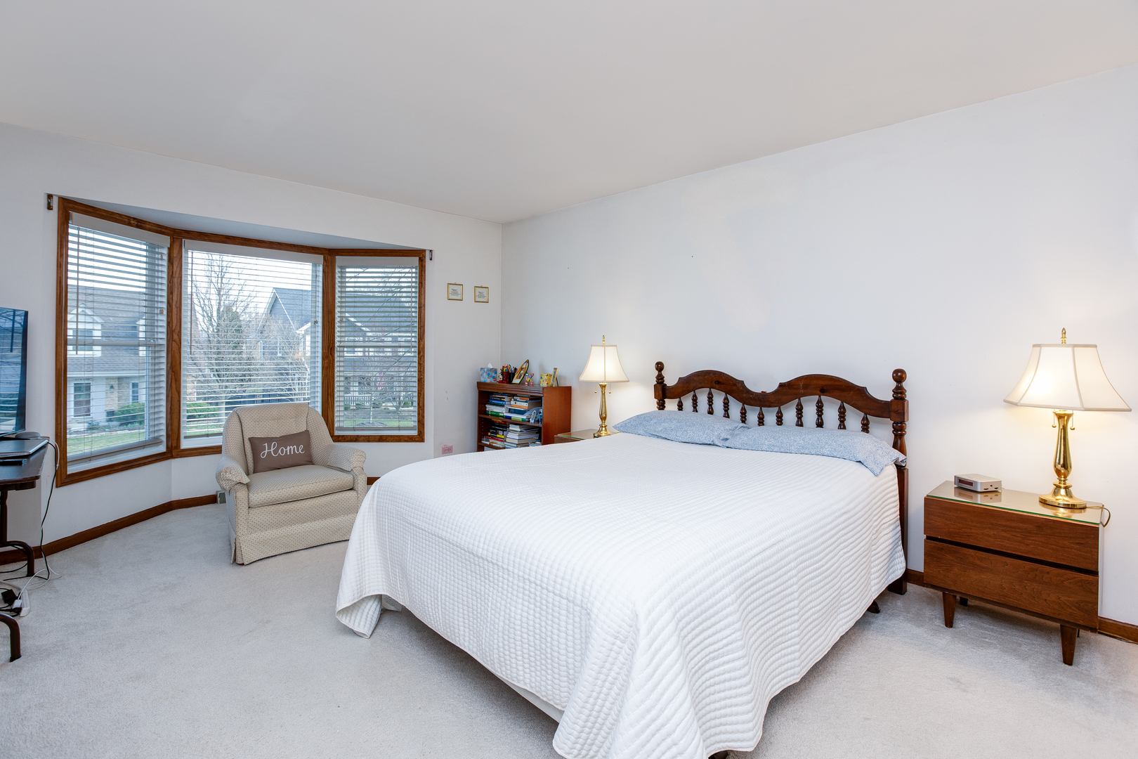 27W337 Churchill Road Winfield, IL 60190 - Photo 14 of 25 a spacious bedroom with a bed and large large window