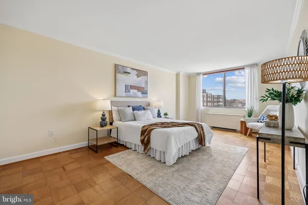 a bed room with a bed and a couch