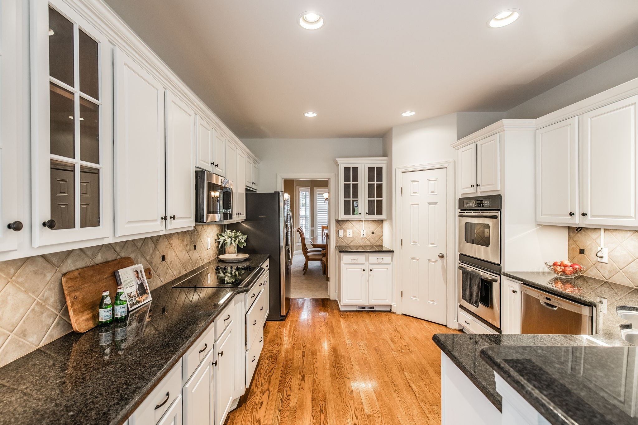 124 Joshuas Run Goodlettsville, TN 37072 - Photo 15 of 60 a kitchen with stainless steel appliances granite countertop a refrigerator stove and sink