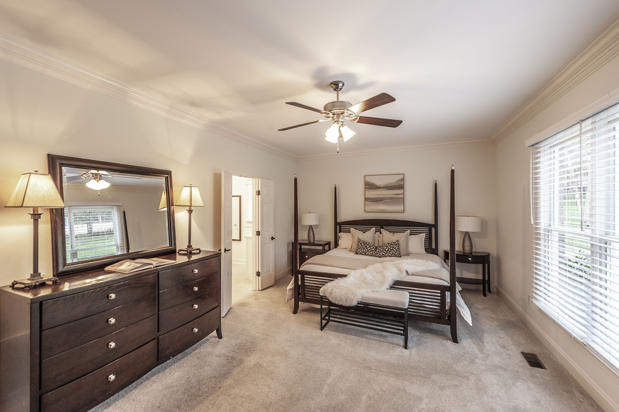 124 Joshuas Run Goodlettsville, TN 37072 - Photo 18 of 60 a bedroom with a bed and a mirror on dresser
