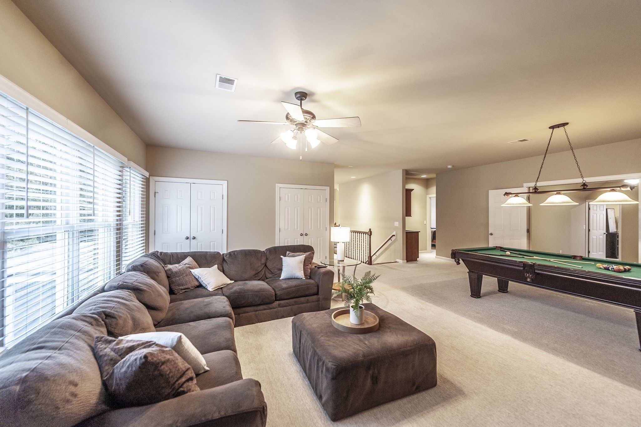 124 Joshuas Run Goodlettsville, TN 37072 - Photo 26 of 60 a living room with furniture a couch and a chandelier