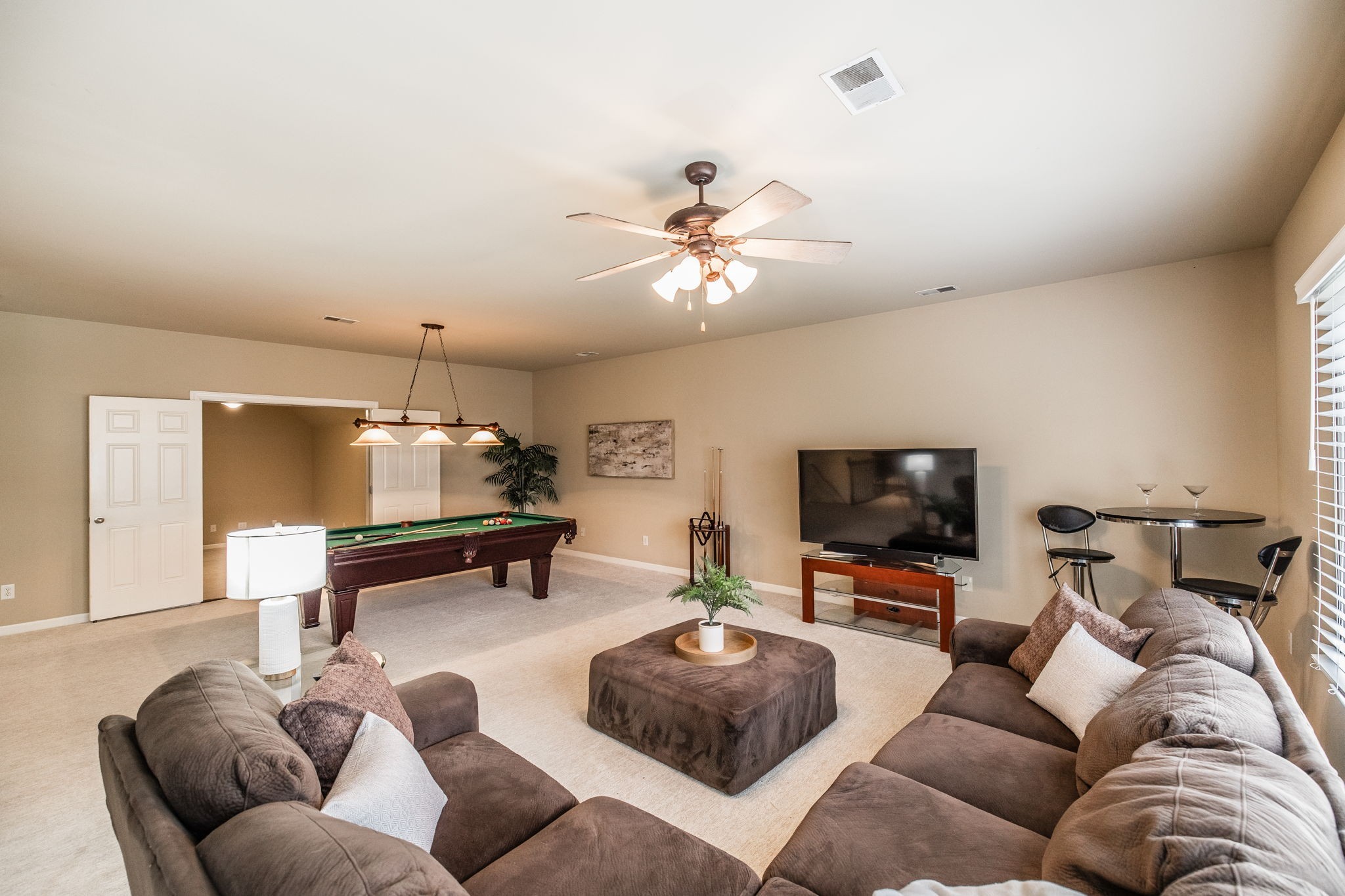 124 Joshuas Run Goodlettsville, TN 37072 - Photo 27 of 60 a living room with furniture and a flat screen tv