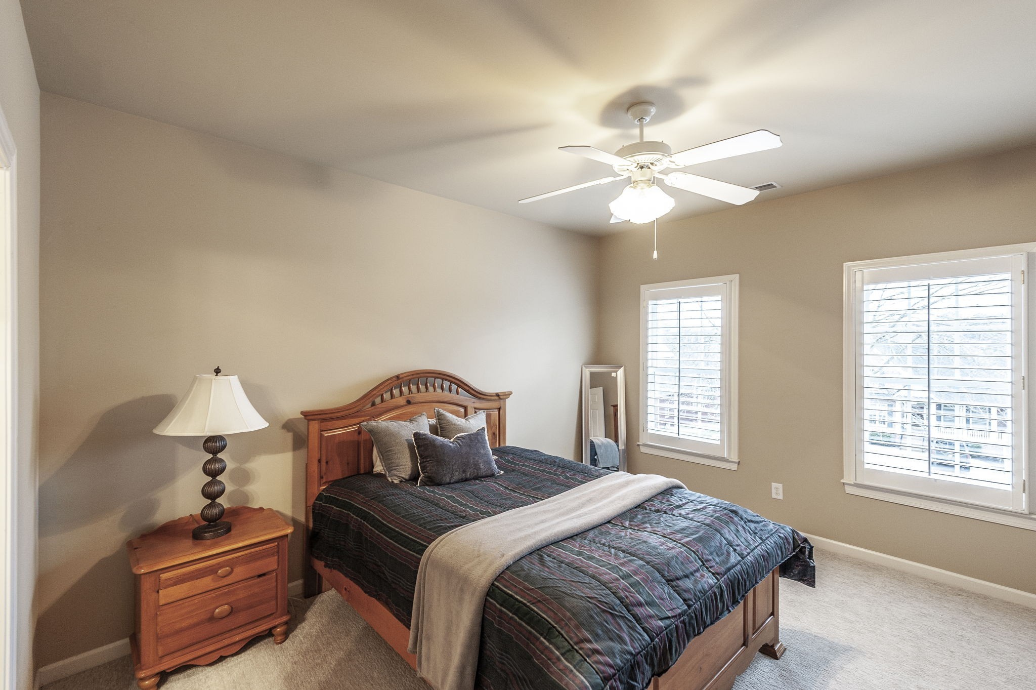 124 Joshuas Run Goodlettsville, TN 37072 - Photo 31 of 60 a bedroom with a bed and window