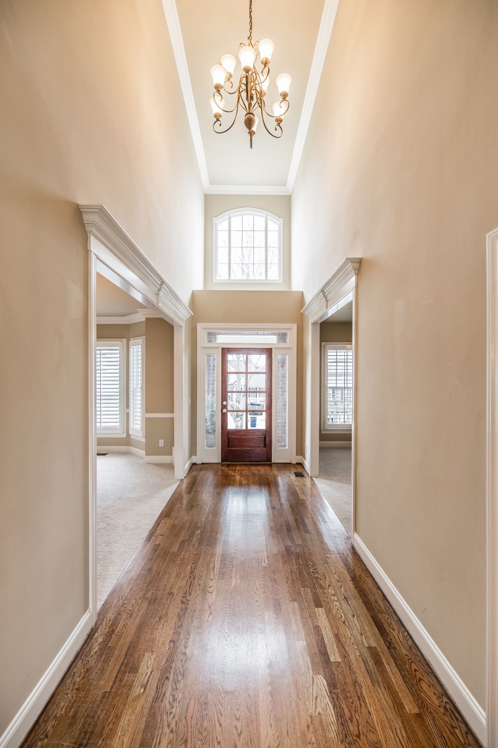 124 Joshuas Run Goodlettsville, TN 37072 - Photo 4 of 60 a view of an empty room with wooden floor and a window