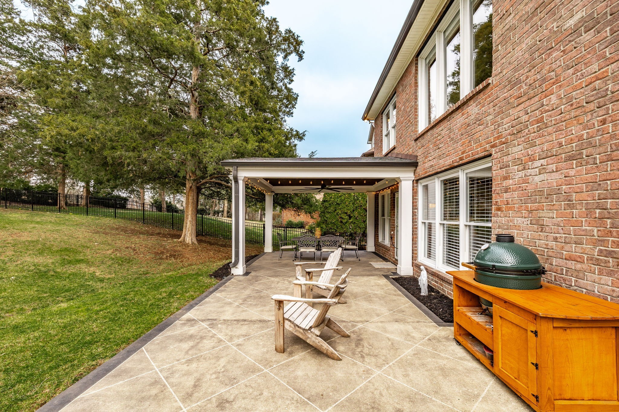 124 Joshuas Run Goodlettsville, TN 37072 - Photo 47 of 60 a view of a patio with table and chairs next to a yard