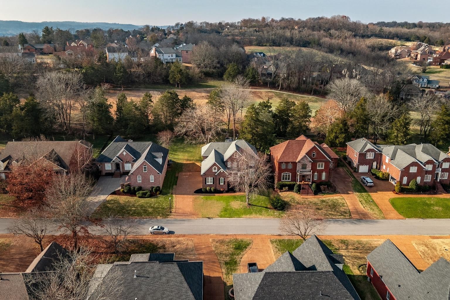 124 Joshuas Run Goodlettsville, TN 37072 - Photo 52 of 60 an aerial view of a house with yard swimming pool and mountain view
