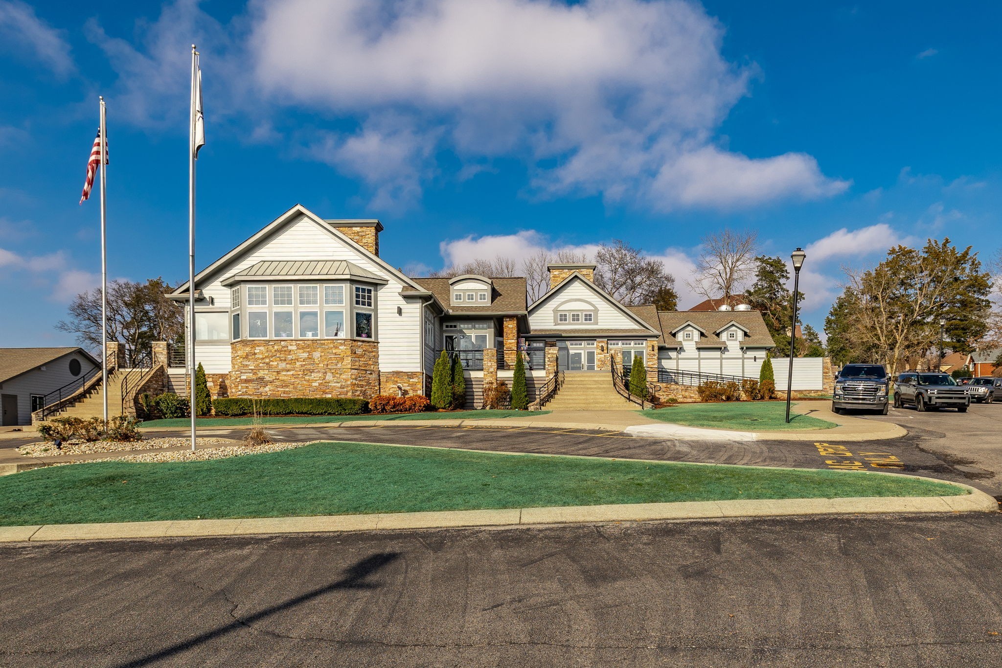 124 Joshuas Run Goodlettsville, TN 37072 - Photo 59 of 60 a view of a big house with table and chairs in a yard