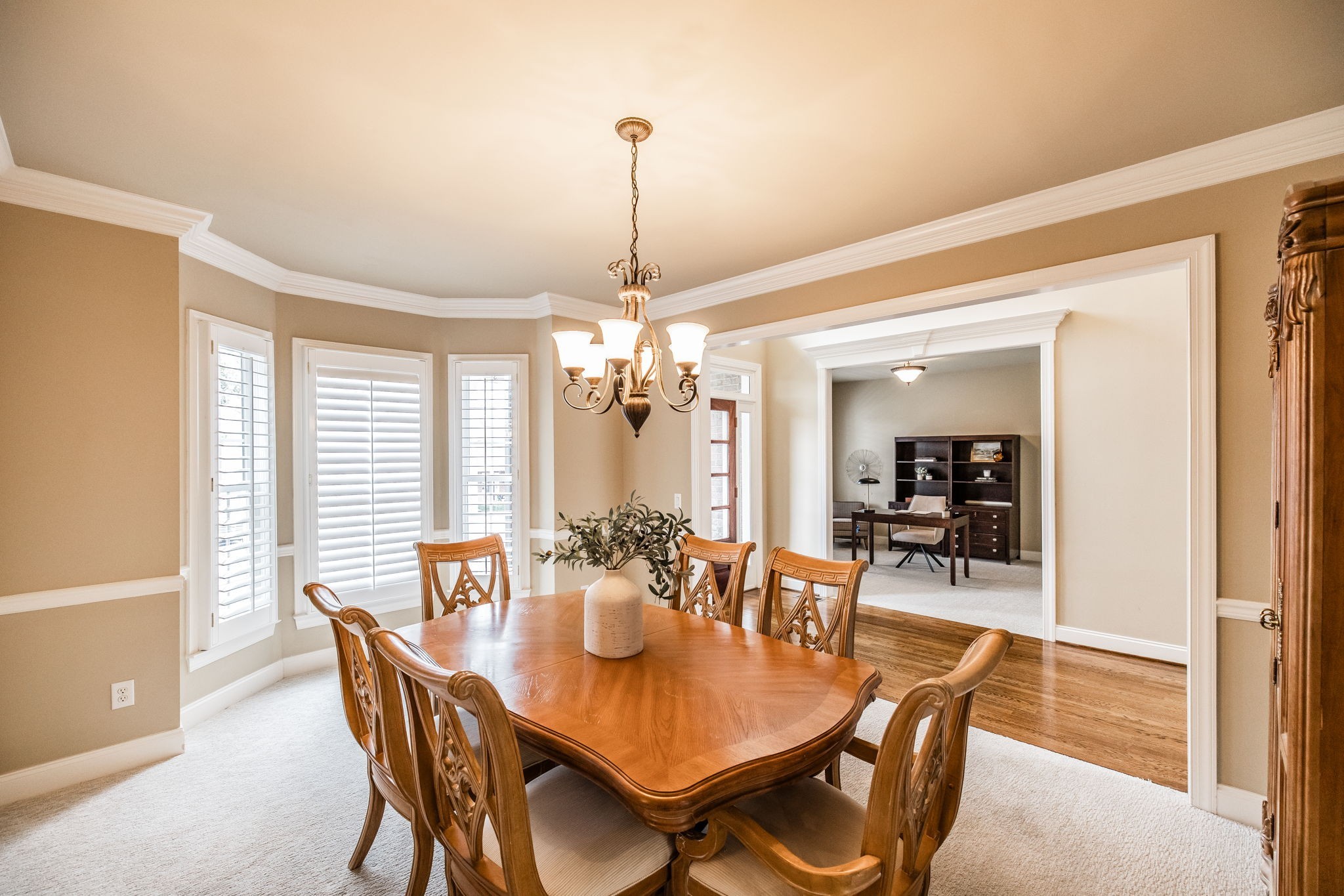 124 Joshuas Run Goodlettsville, TN 37072 - Photo 7 of 60 a dining room with furniture a chandelier and wooden floor