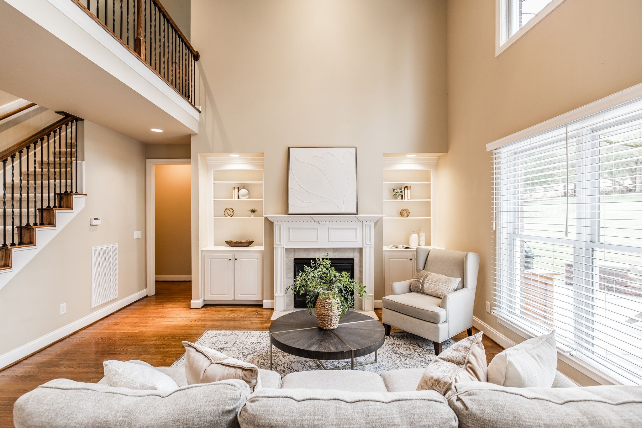 124 Joshuas Run Goodlettsville, TN 37072 - Photo 10 of 60 a living room with furniture fireplace and a large window