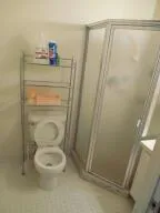 a bathroom with a toilet and a sink