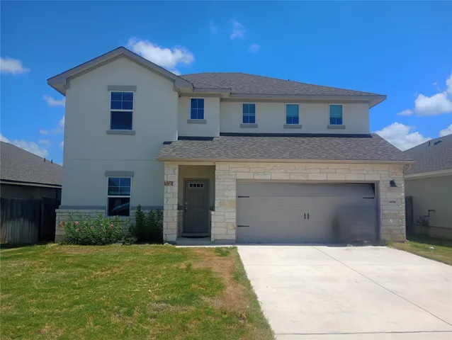 a house view with a backyard space