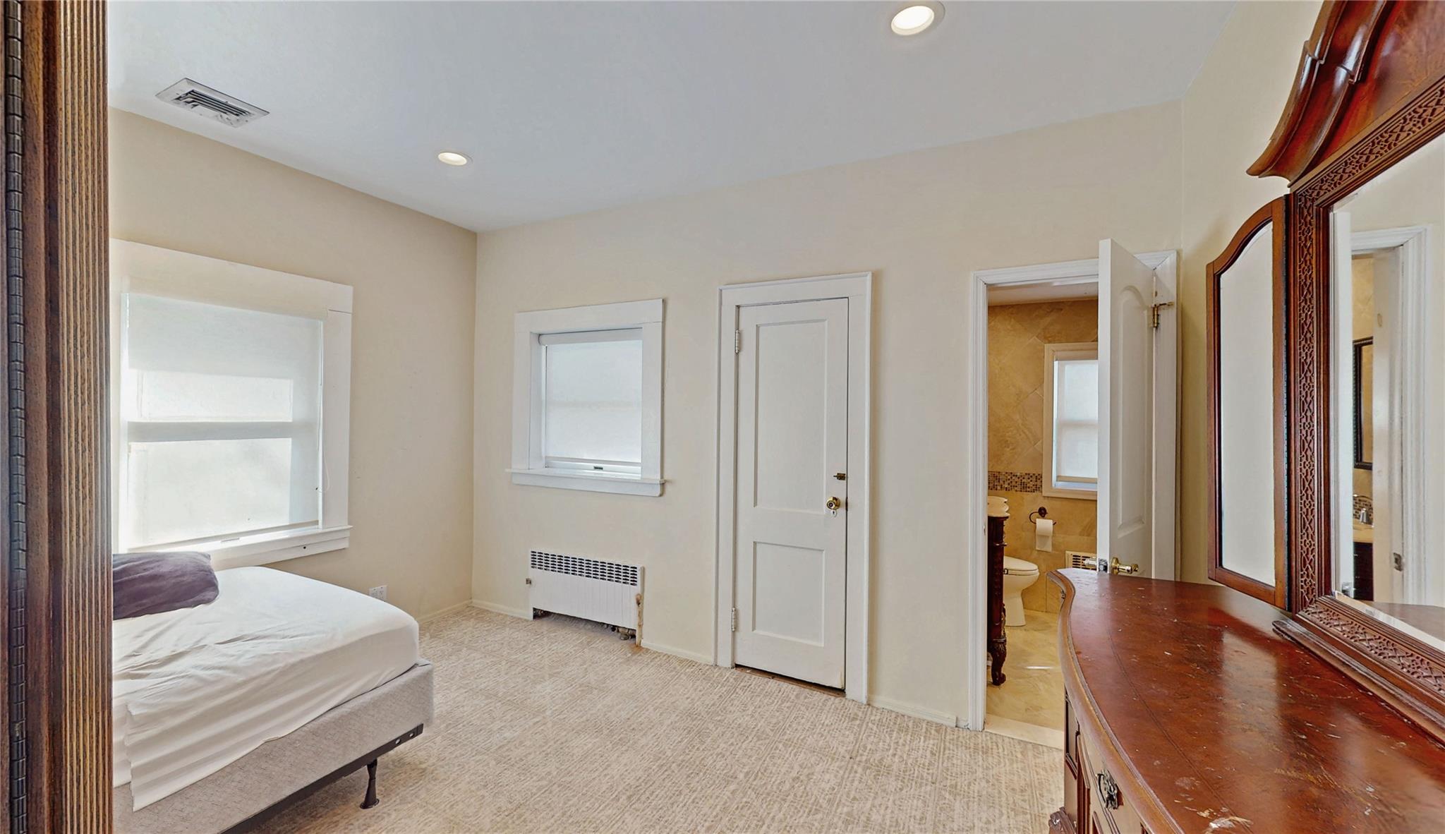 339 Midwood Road Woodmere, NY 11598 - Photo 31 of 49 a room with a bed and a window