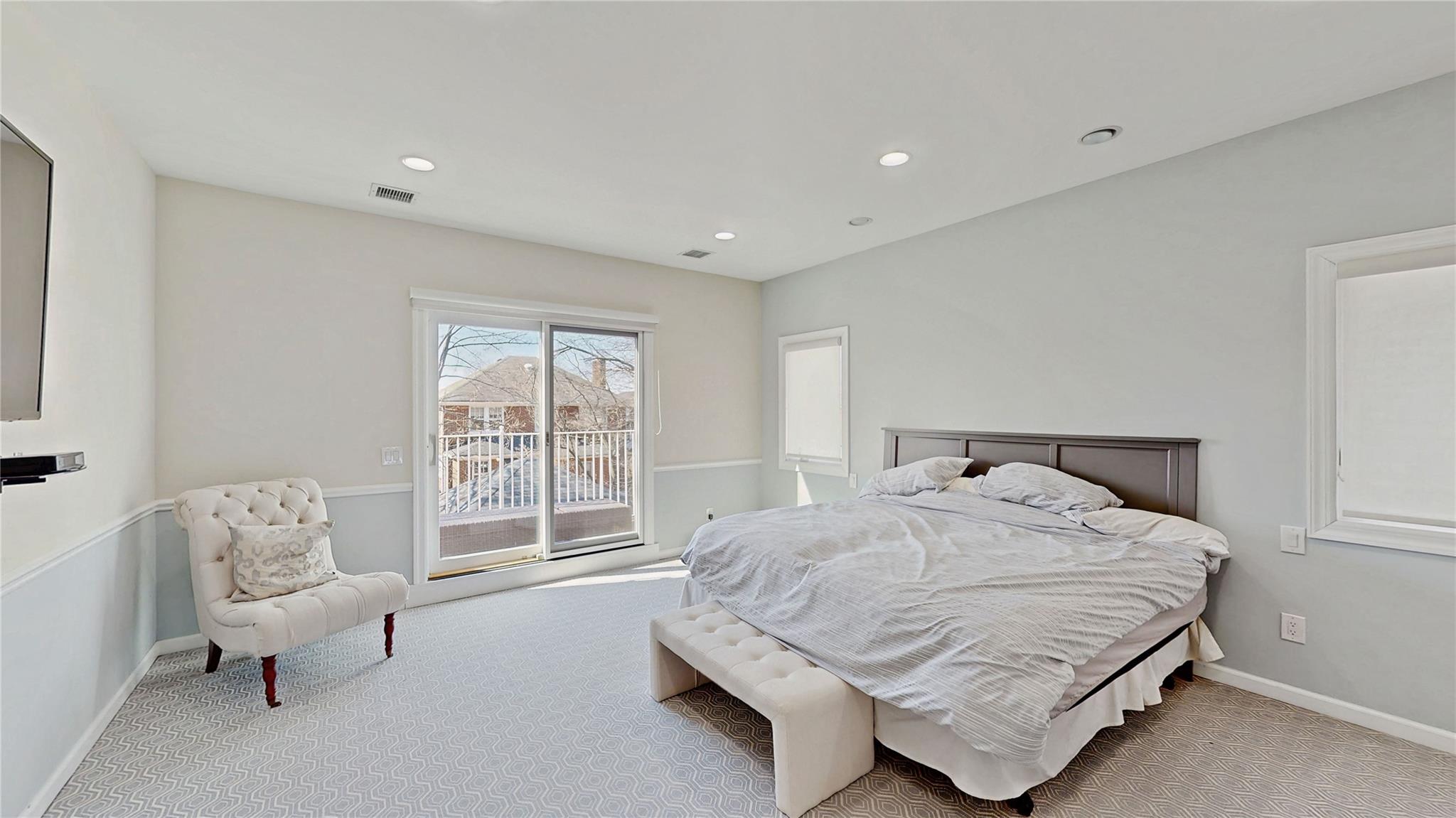 339 Midwood Road Woodmere, NY 11598 - Photo 41 of 49 a bedroom with a bed and a window