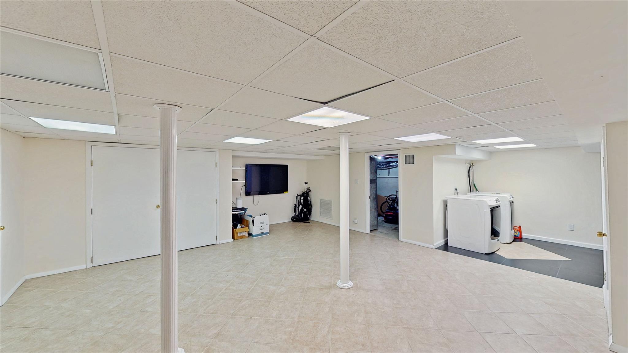 339 Midwood Road Woodmere, NY 11598 - Photo 44 of 49 a view of a room with gym equipment