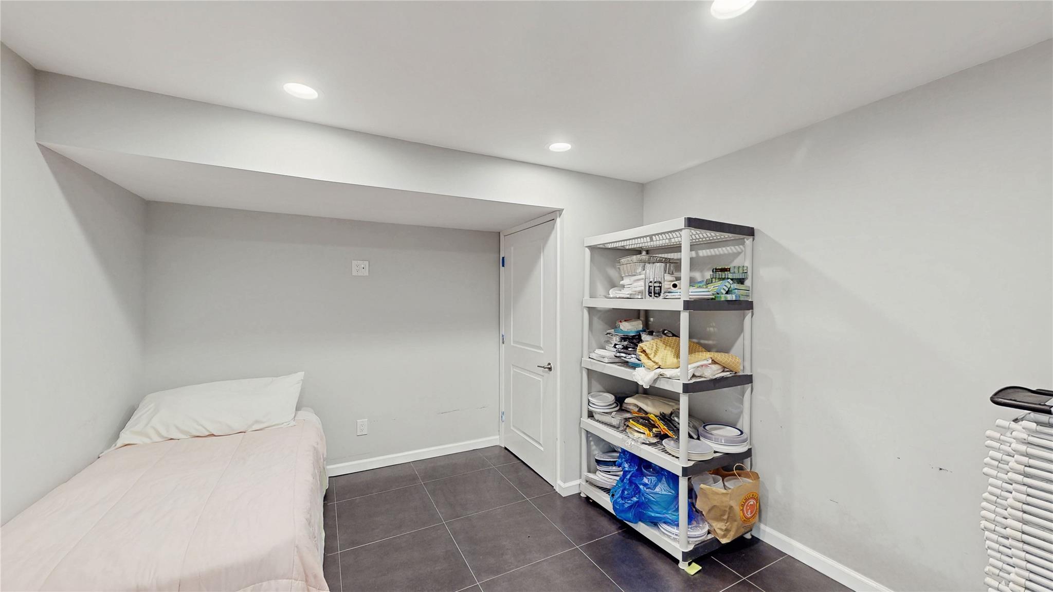 339 Midwood Road Woodmere, NY 11598 - Photo 47 of 49 a room with storage and utility