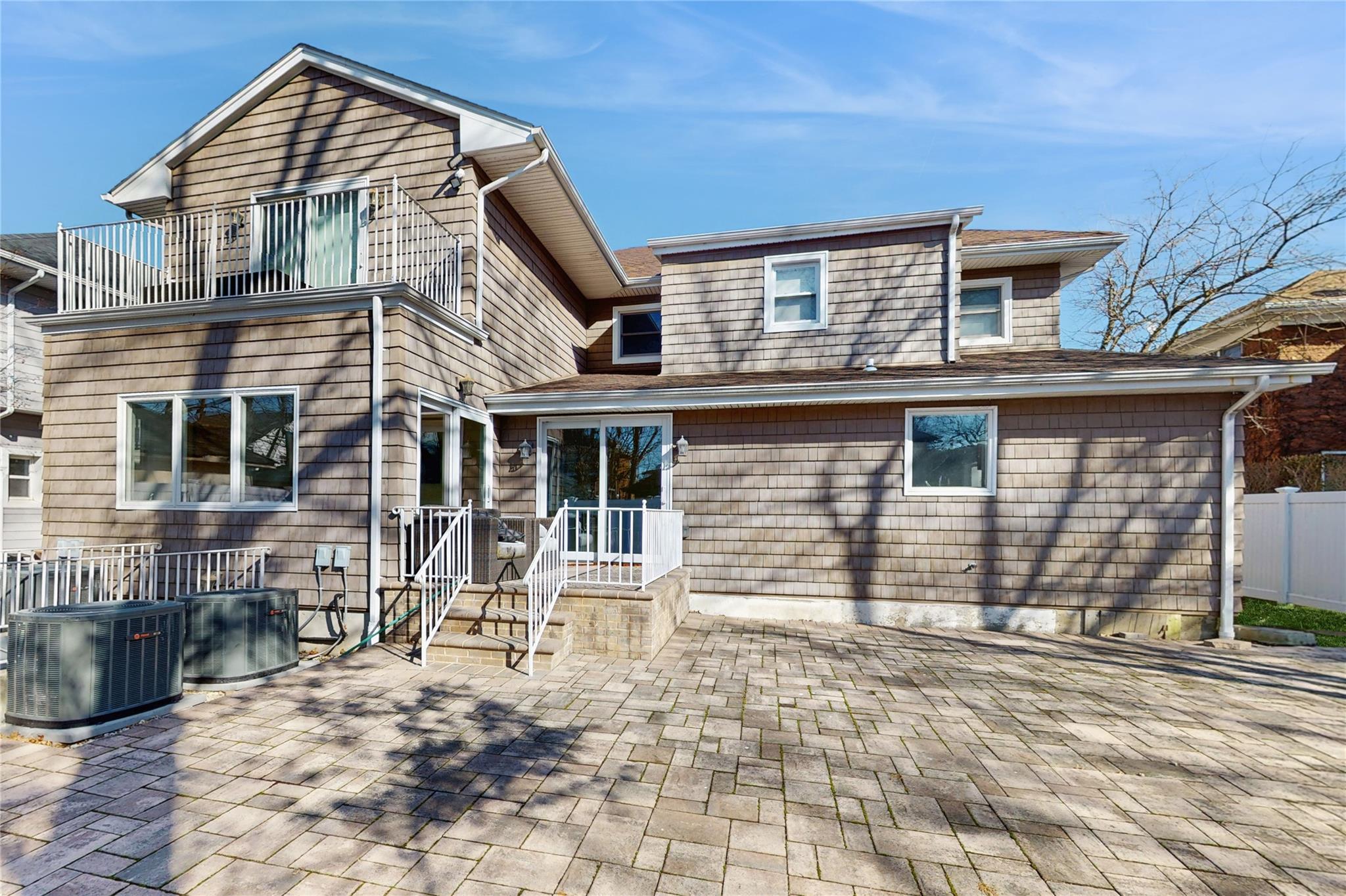 339 Midwood Road Woodmere, NY 11598 - Photo 48 of 49 a front view of a house