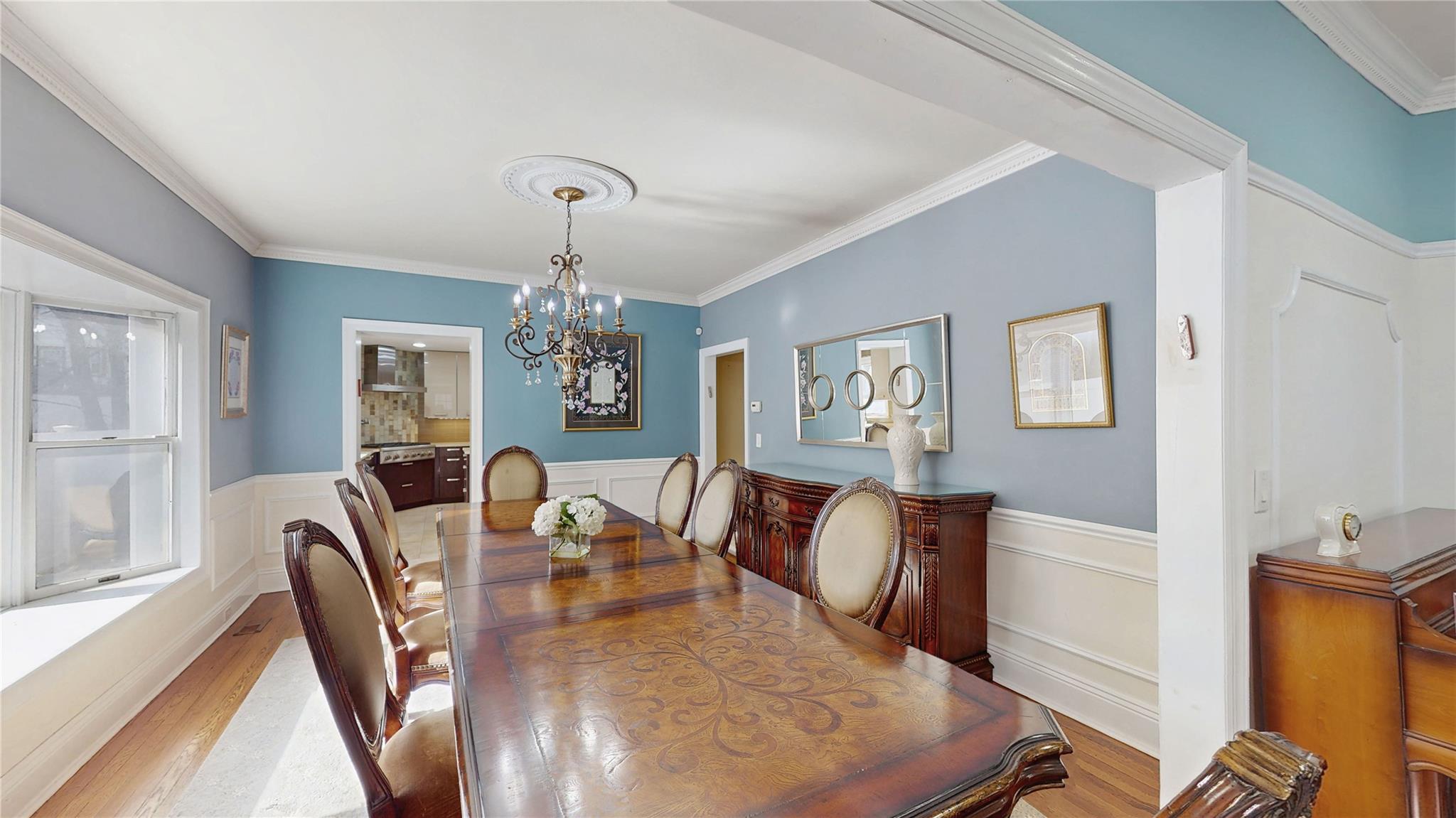 339 Midwood Road Woodmere, NY 11598 - Photo 9 of 49 a view of a dining room with furniture