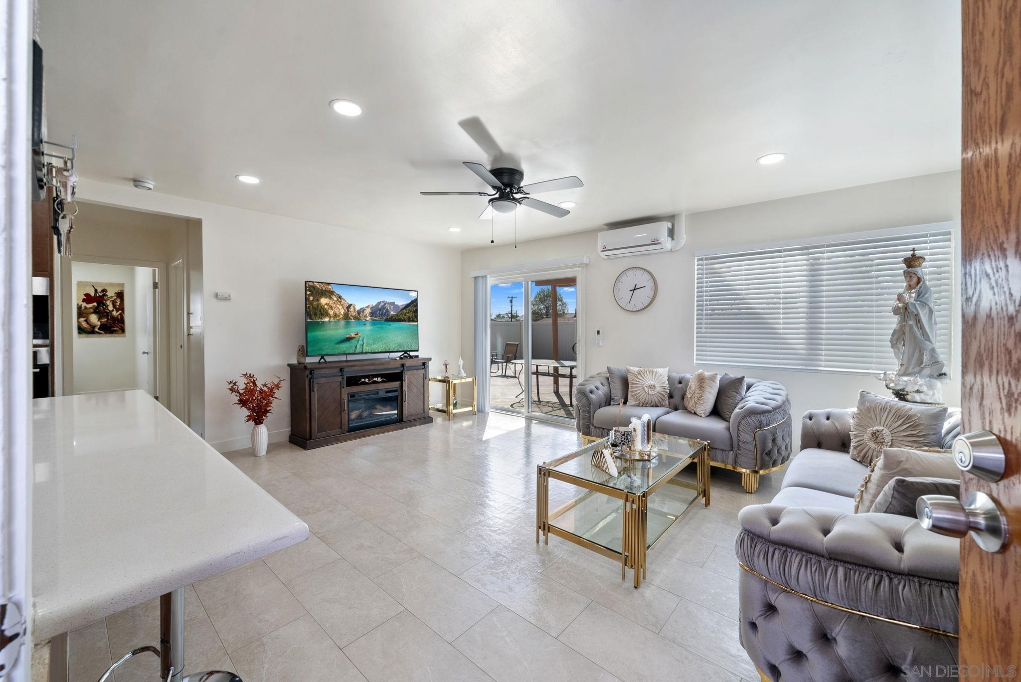 1407 5 D Drive El Cajon, CA 92021 - Photo 18 of 37 a living room with furniture and a flat screen tv