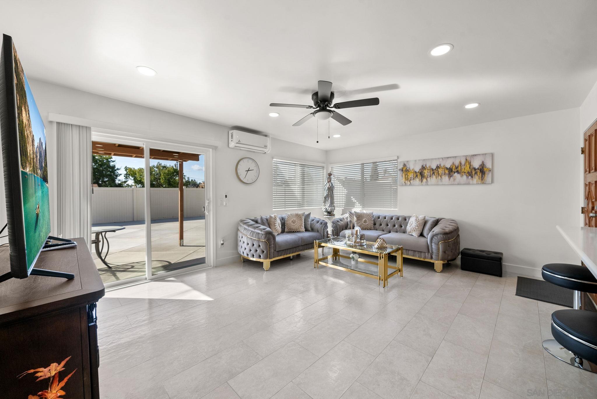 1407 5 D Drive El Cajon, CA 92021 - Photo 19 of 37 a living room with furniture and a flat screen tv