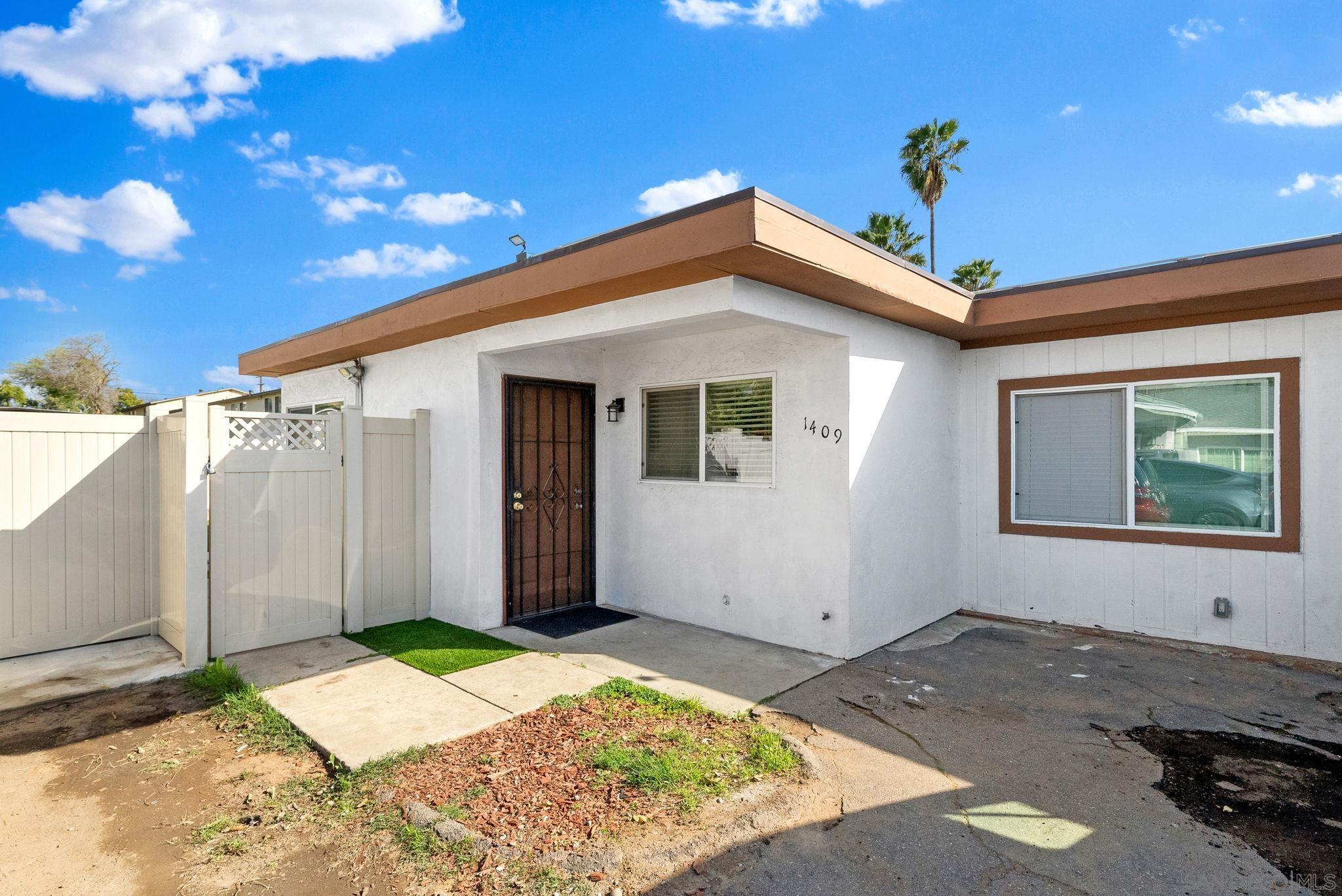 1407 5 D Drive El Cajon, CA 92021 - Photo 25 of 37 a view of backyard of the house