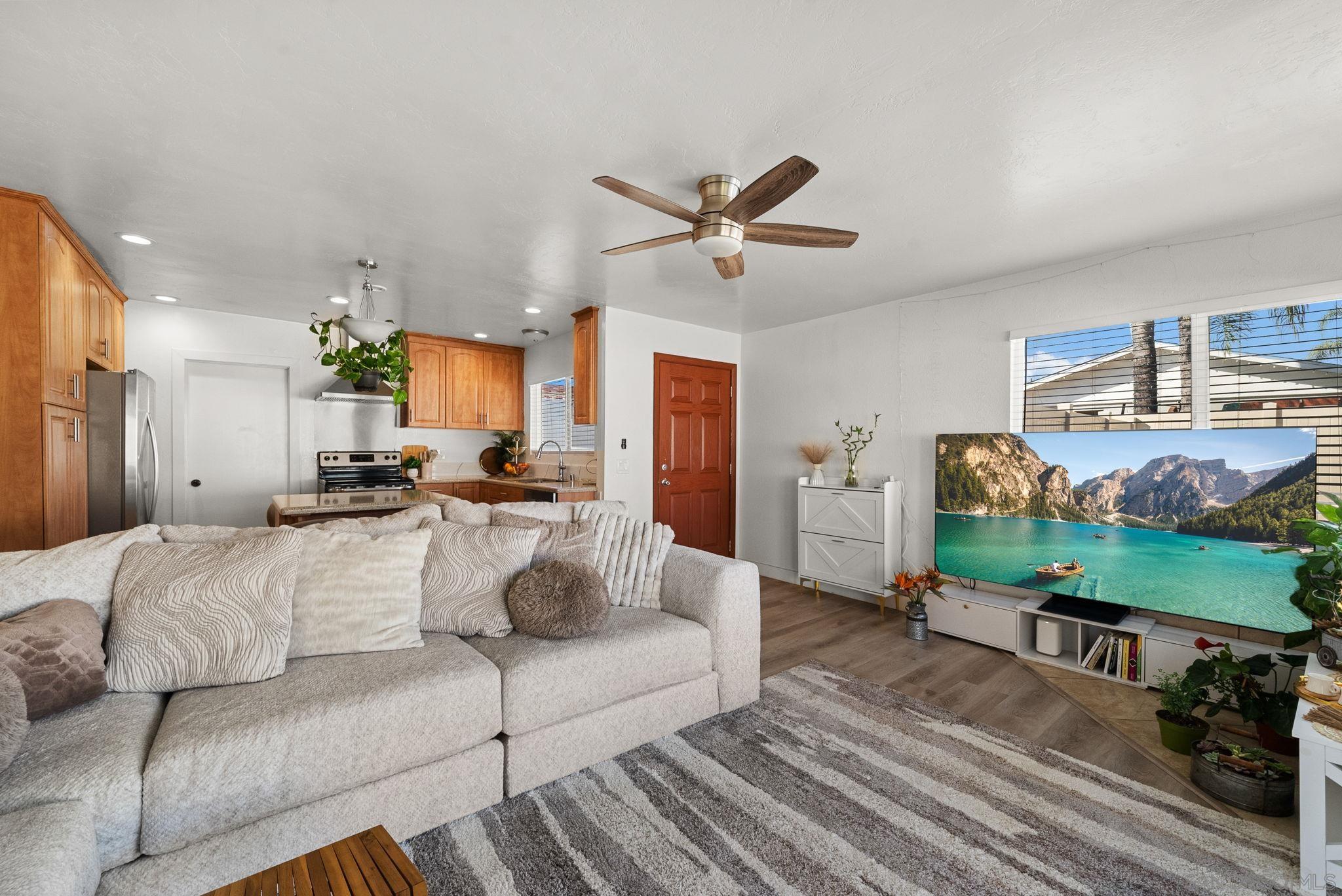 1407 5 D Drive El Cajon, CA 92021 - Photo 28 of 37 a living room with furniture and a flat screen tv