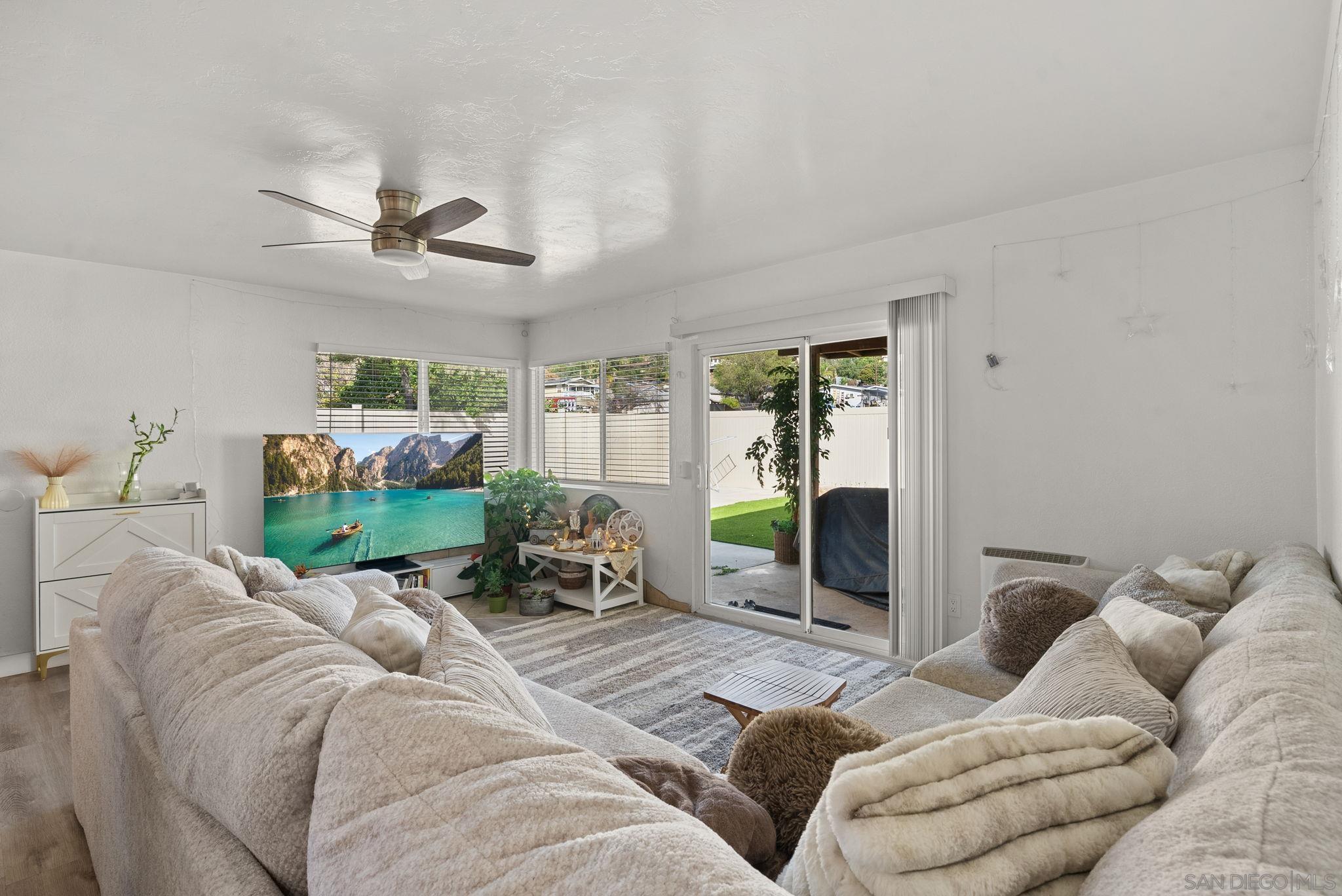 1407 5 D Drive El Cajon, CA 92021 - Photo 31 of 37 a living room with furniture and a flat screen tv