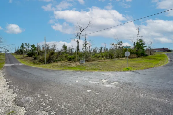 a view of a golf course with a big yard