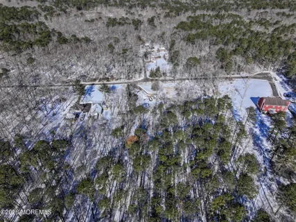 a aerial view of residential house with outdoor space