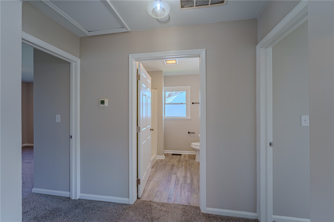 1005 Burt Street Springfield, OH 45505 - Photo 17 of 33 This home features inviting interiors, with a bathroom easily accessible from the hallway.