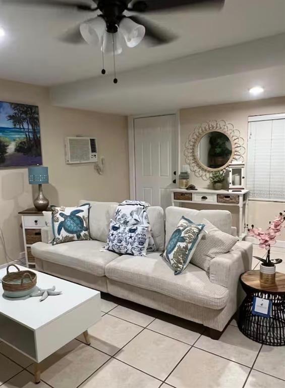 870 South McCall Road, Unit 4 Englewood, FL 34223 - Photo 4 of 7 a living room with furniture and a wooden floor