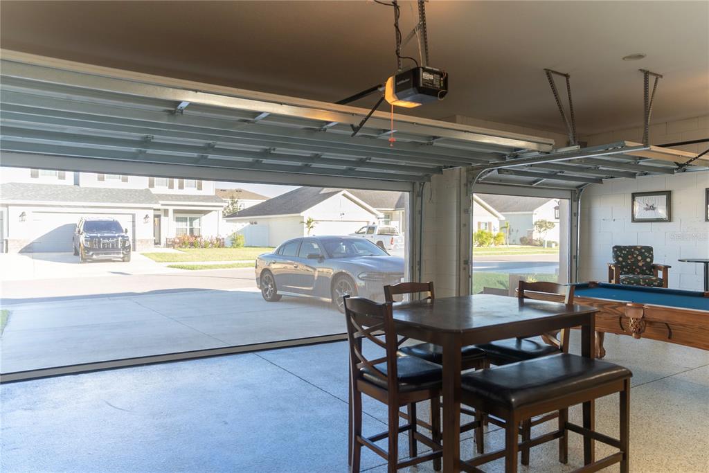8284 Southwest 59th Terrace Ocala, FL 34476 - Photo 47 of 63 a view of a dining room with furniture window and outside view