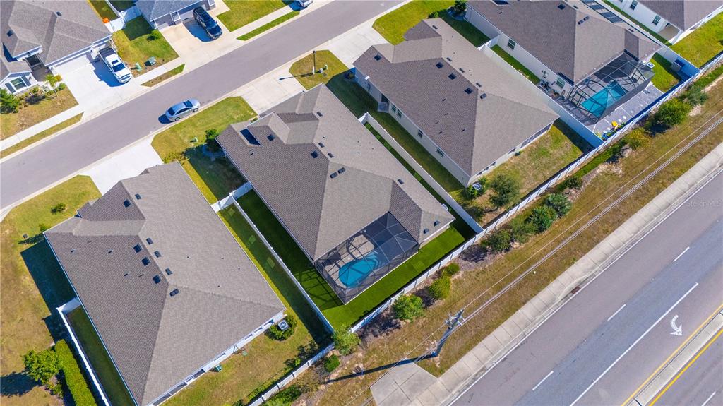 8284 Southwest 59th Terrace Ocala, FL 34476 - Photo 57 of 63 an aerial view of a house with a swimming pool