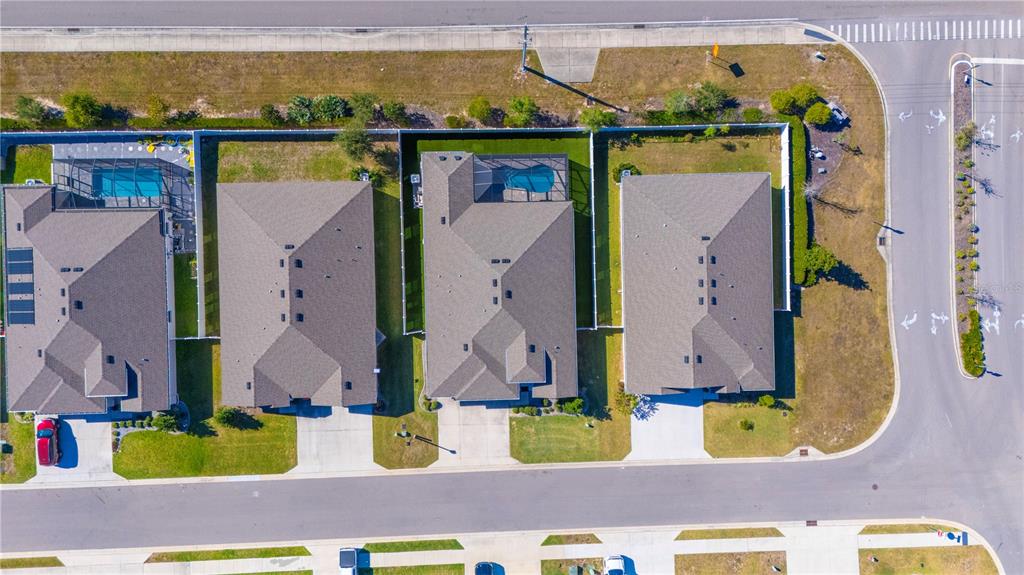 8284 Southwest 59th Terrace Ocala, FL 34476 - Photo 58 of 63 an aerial view of residential house with outdoor space and swimming pool