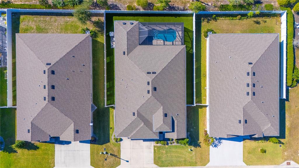 8284 Southwest 59th Terrace Ocala, FL 34476 - Photo 59 of 63 an aerial view of a house with pool patio and deck