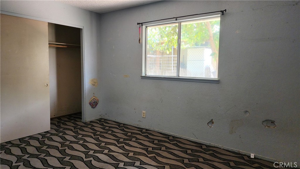 18133 10th Street Bloomington, CA 92316 - Photo 8 of 15 a room with a window